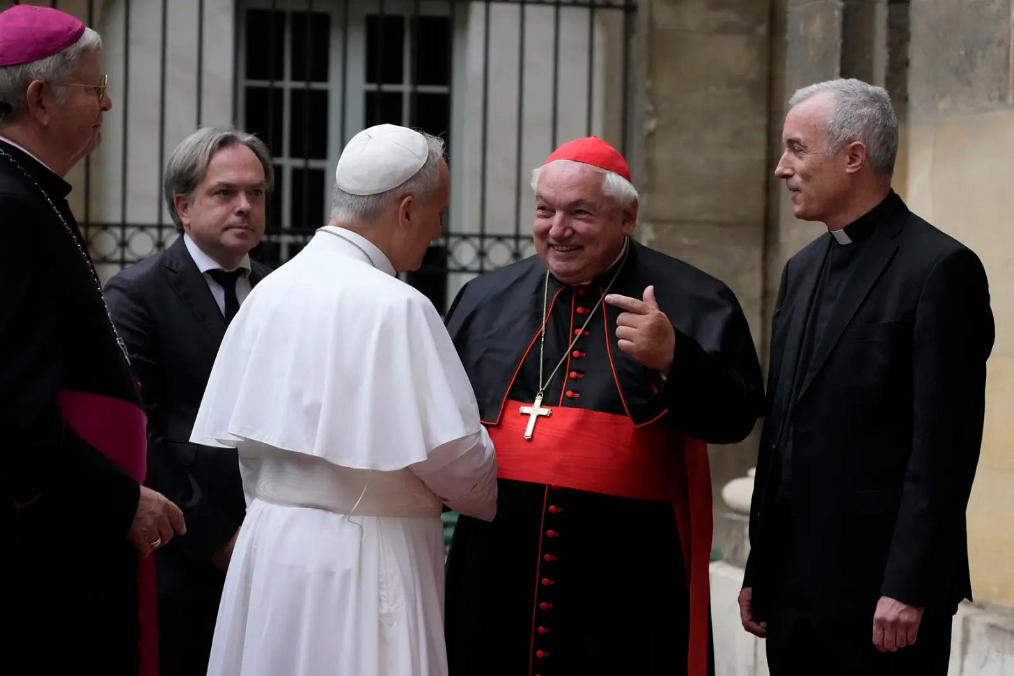 Archbishop Laurent Ulrich and Cardinal Jean-Marc Aveline greet Pope Leo XIV at the Institut Catholique de Paris Archbishop Laurent Ulrich and Cardinal Jean-Marc Aveline greet Pope Leo XIV at the Institut Catholique de Paris