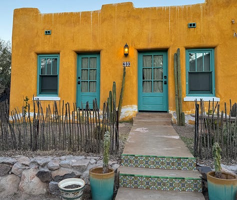 The photos display nine homes in the Sonoran architectural style traditional to the Southwest of the United States. The homes feature flat roofs, front walls that begin at the sidewalk's edge, colorful stucco exterior walls, and large windows.