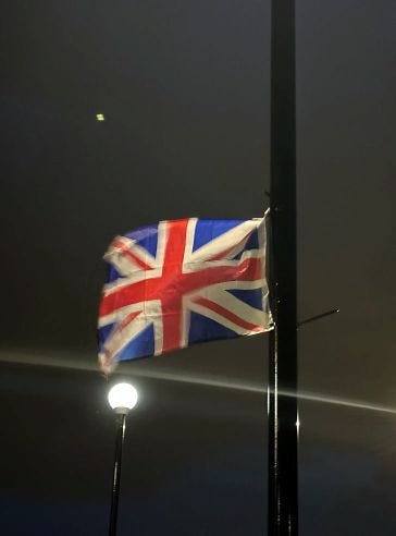 A Union Jack flag on a lamppost. A Union Jack flag on a lamppost.