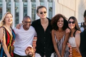 Millennials pose for a photo Credit: Kampus Production, via Pexels