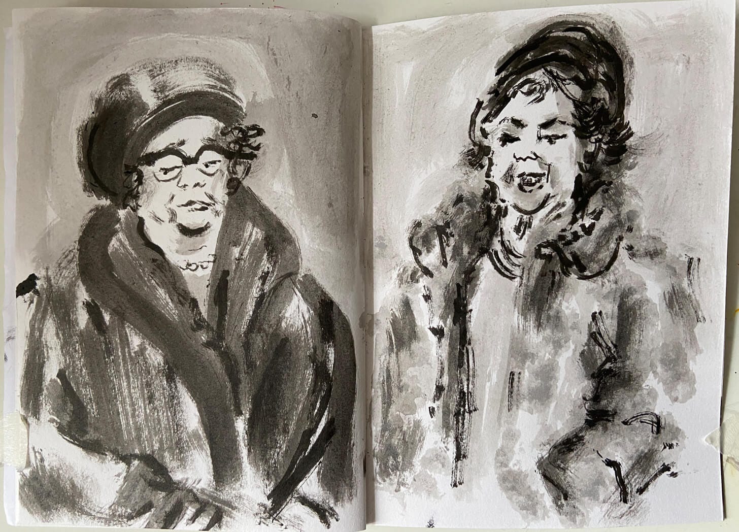 Sketchbook of textured, expressive drawings of two older women in large formal coats and hats. The drawings are made from film footage using ink. Drawings by Nanette Regan Sketchbook of textured, expressive drawings of two older women in large formal coats and hats. The drawings are made from film footage using ink. Drawings by Nanette Regan