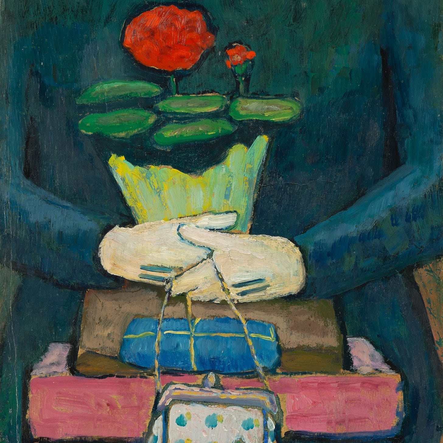 A person's lap, with one hand on the other holding a purse, three rectangular objects, and a potted plant with red flowers.