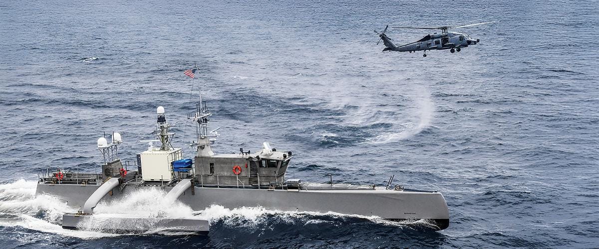 The medium displacement unmanned surface vessel Seahawk and an MH-60R Sea Hawk helicopter participate in U.S. Pacific Fleet’s Unmanned Systems Integrated Battle Problem.