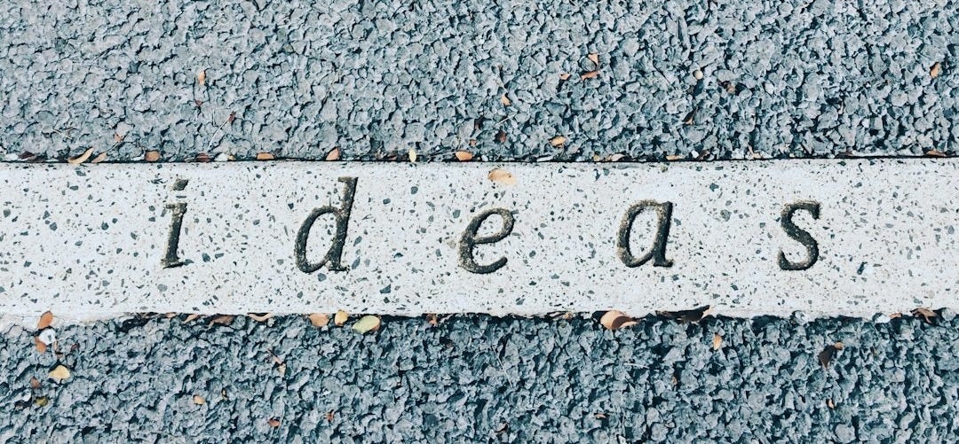 ideas carved on concrete surface