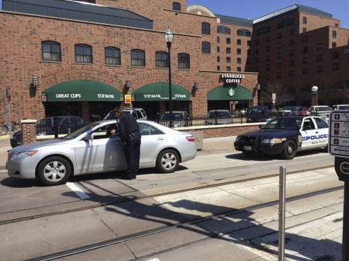 Violations abound of cars in the bike lane on Washington Ave. SE Violations abound of cars in the bike lane on Washington Ave. SE