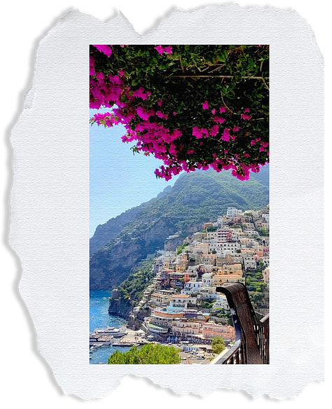 Six images of Italy. Image one a table set looking out onto the city. A cat peeping over some rocks, a highway that overlooks blue ocean, a shot of the coast with house built up on hits overlooking ocean, an old bright red fiat and lemon tree that looks over the beach.