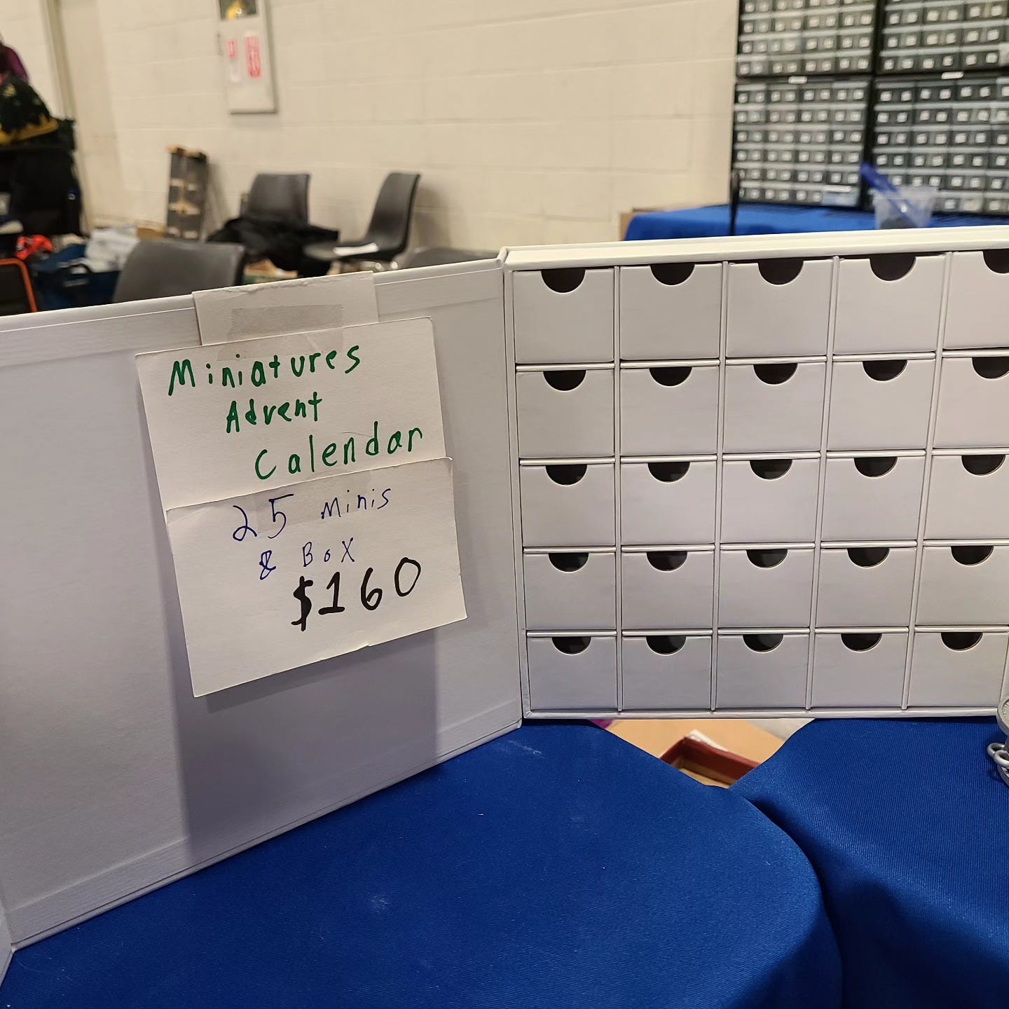 May be an image of text that says 'Miniatures Advent Calendar 25 Minis $160 B6X'