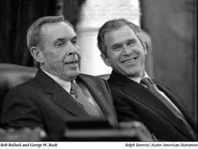 A couple of men in suits

Description automatically generated