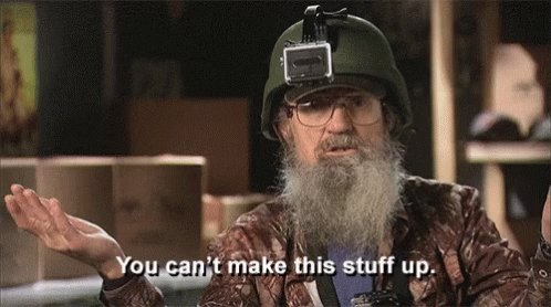 a man with a beard is wearing a helmet and glasses and says you can 't make this stuff up