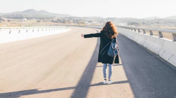 982 Girl Hitchhiking Stock Photos, Pictures & Royalty-Free Images - iStock