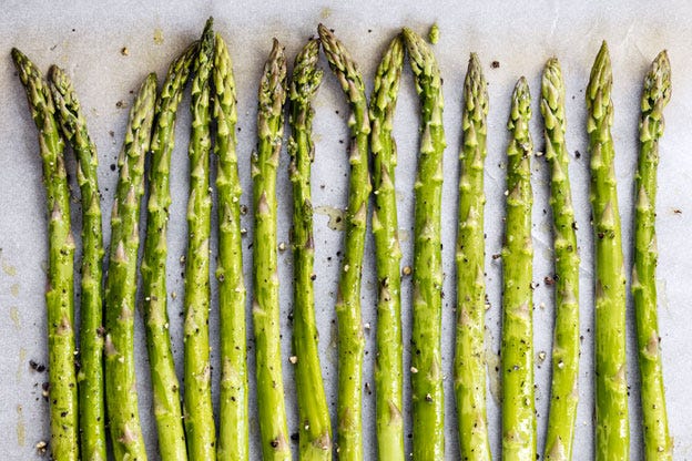 Asparagus spears with garlic grapeseed oil and rancher steak rub. Asparagus spears with garlic grapeseed oil and rancher steak rub.