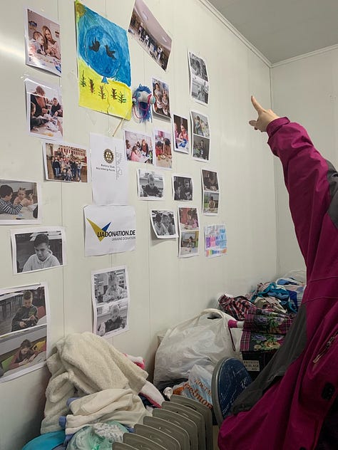 mages of hand-made pro-Ukraine wall posters featuring cats at a community help center in Dnipro, Ukraine.