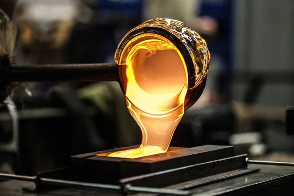 Pouring Molten Glass into Graphite Mold — Stock Photo © aetb #160742568
