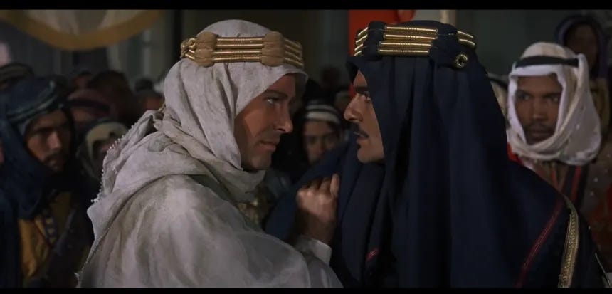 1916–1918 — Faisal bin Hussein (right) with T.E. Lawrence (“Lawrence of Arabia”) during the Arab Revolt against Ottoman rule. Arab forces fought alongside Britain based on promises of postwar independence, but the postwar settlement created competing British and French mandates instead of the Arab political order many leaders expected.