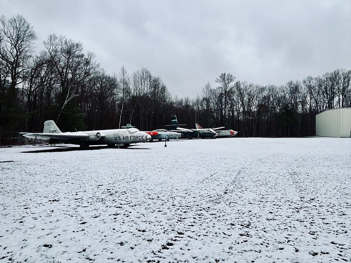 snow, trees, parking lot, cars, signs