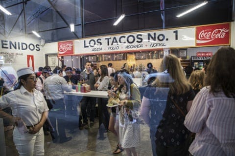 Customers dining at Los Tacos No 1 in Times Square