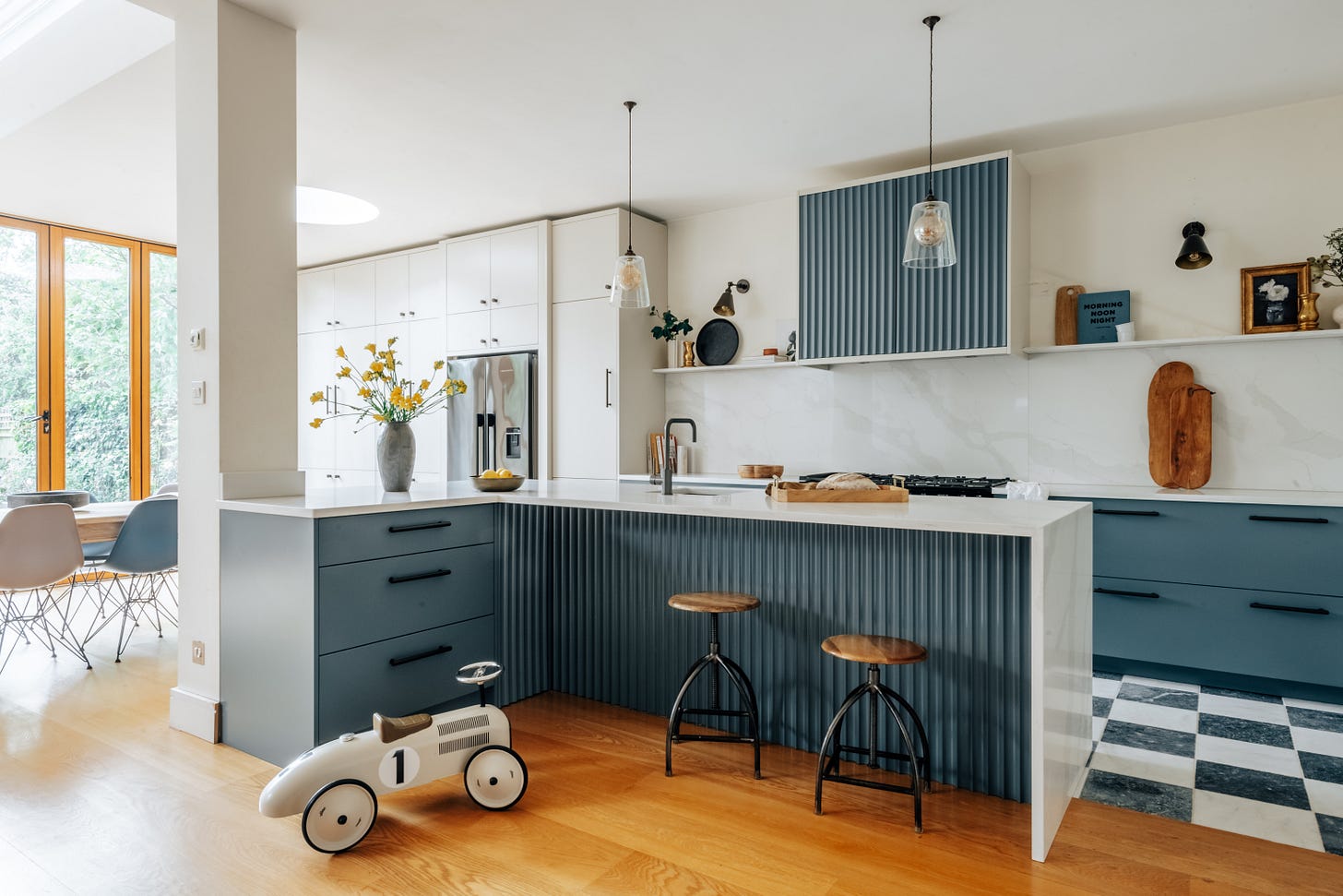 engineered wood flooring, marble flooring, bespoke cabinets