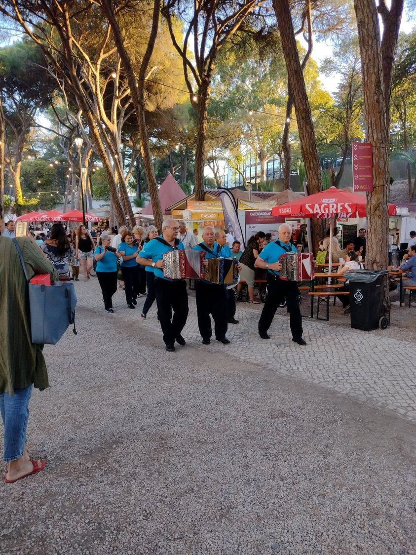 People walking and playing instruments People walking and playing instruments