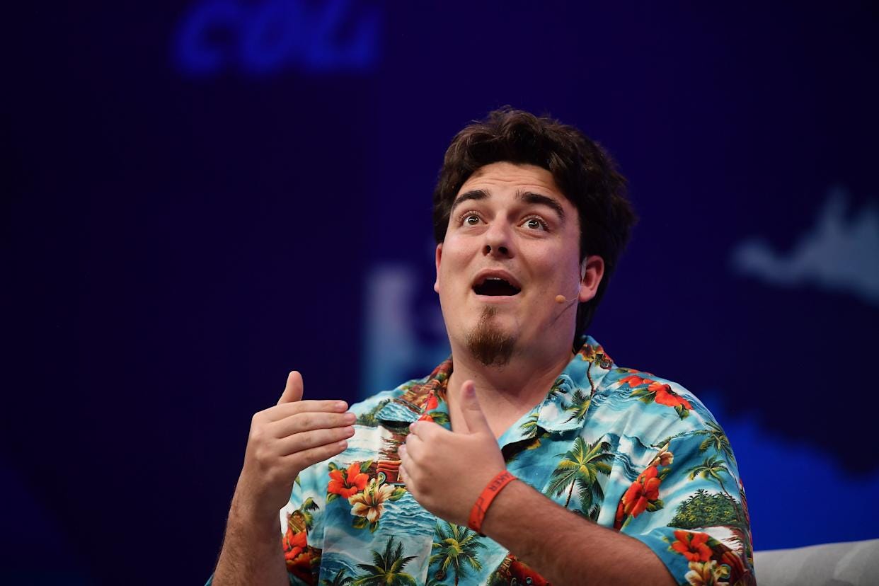 Palmer Luckey talking on stage Palmer Luckey talking on stage