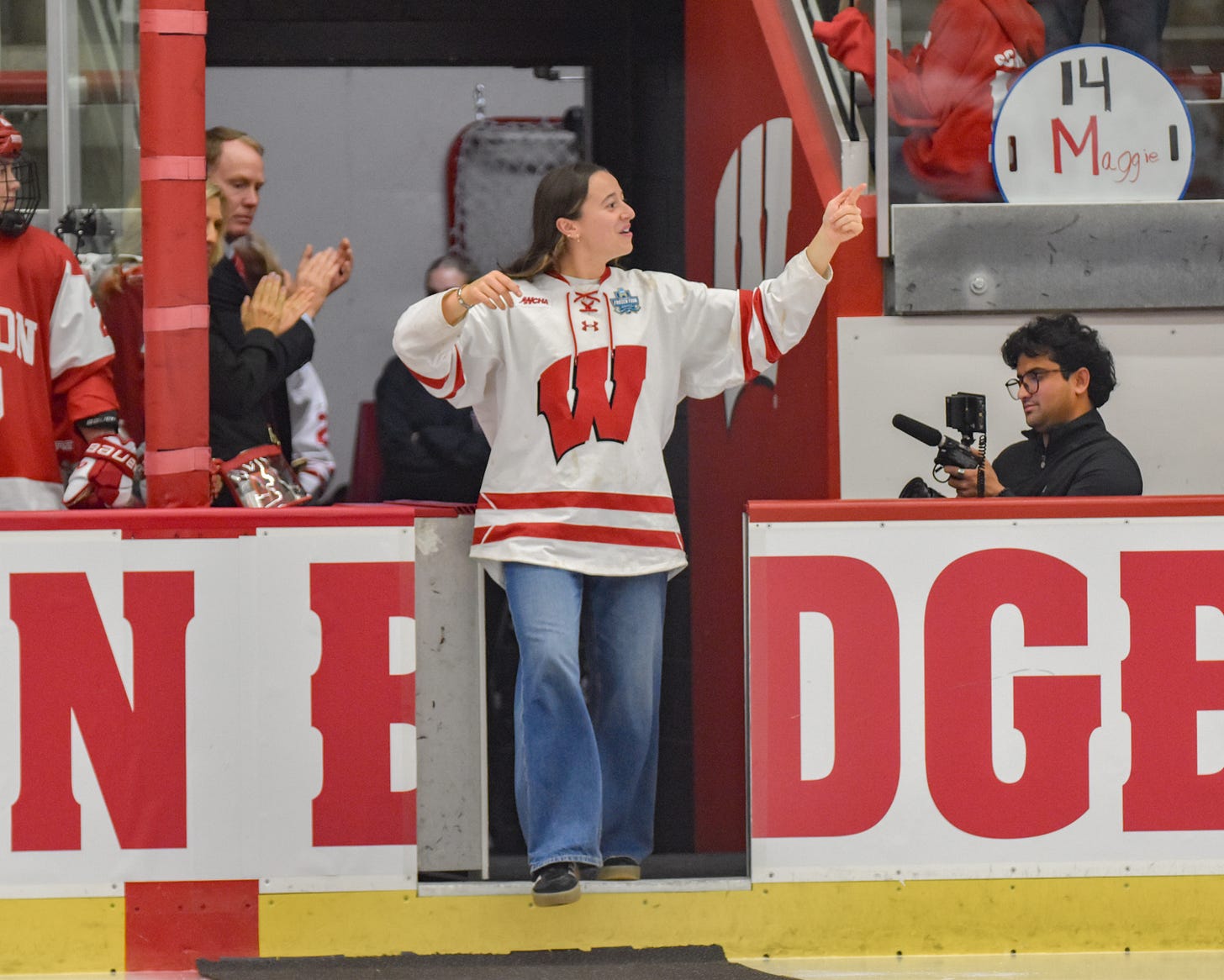 Marianne Picard walks out of the Wisconsin women's hockey tunnel onto the ice