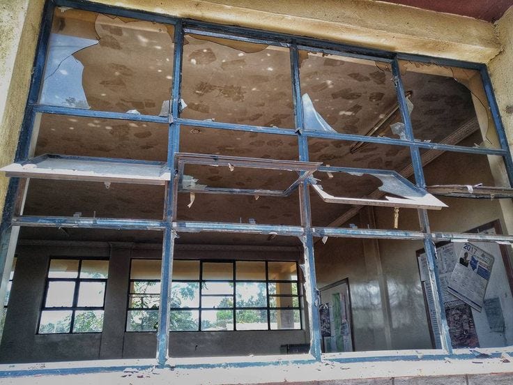 Broken windows at Raila educational centre a result of yesternights  exchange between stone-throwing youth in kibera and policemen. … | Broken  window, Kibera, Slums