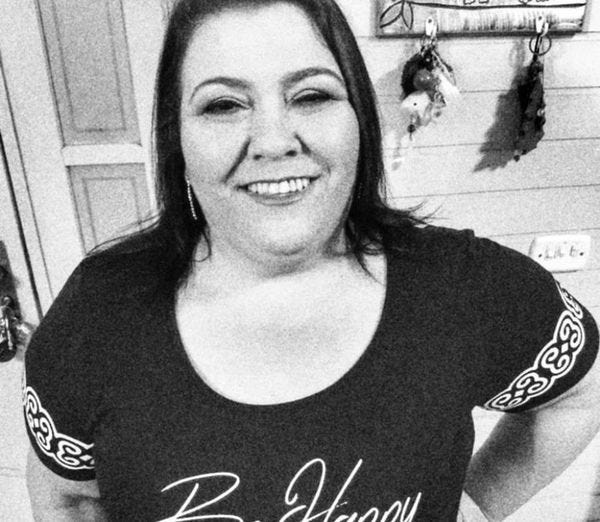 May be a black-and-white image of 1 person, smiling and text