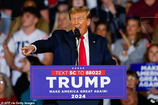 Trump is slammed for encouraging Russia to attack NATO allies who 'don't pay their dues', with ...