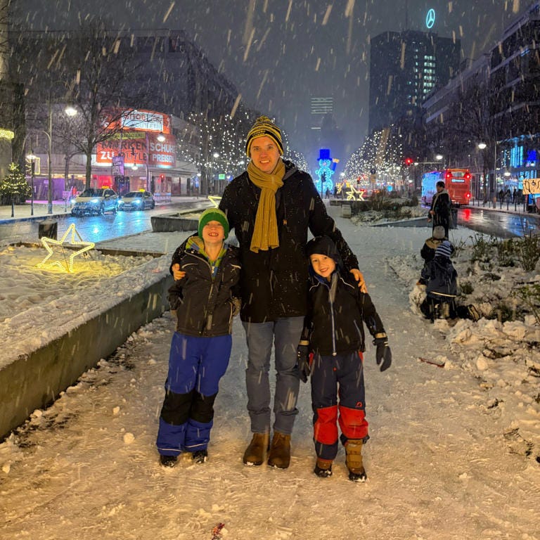 Chris Ford with his two children in Berlin.