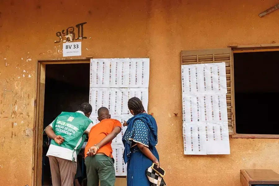Voters look for their names on the voters roll at a polling station ahead of Mali's referendum vote in Bamako, Mali on June 18, 2023. Voters look for their names on the voters roll at a polling station ahead of Mali's referendum vote in Bamako, Mali on June 18, 2023.