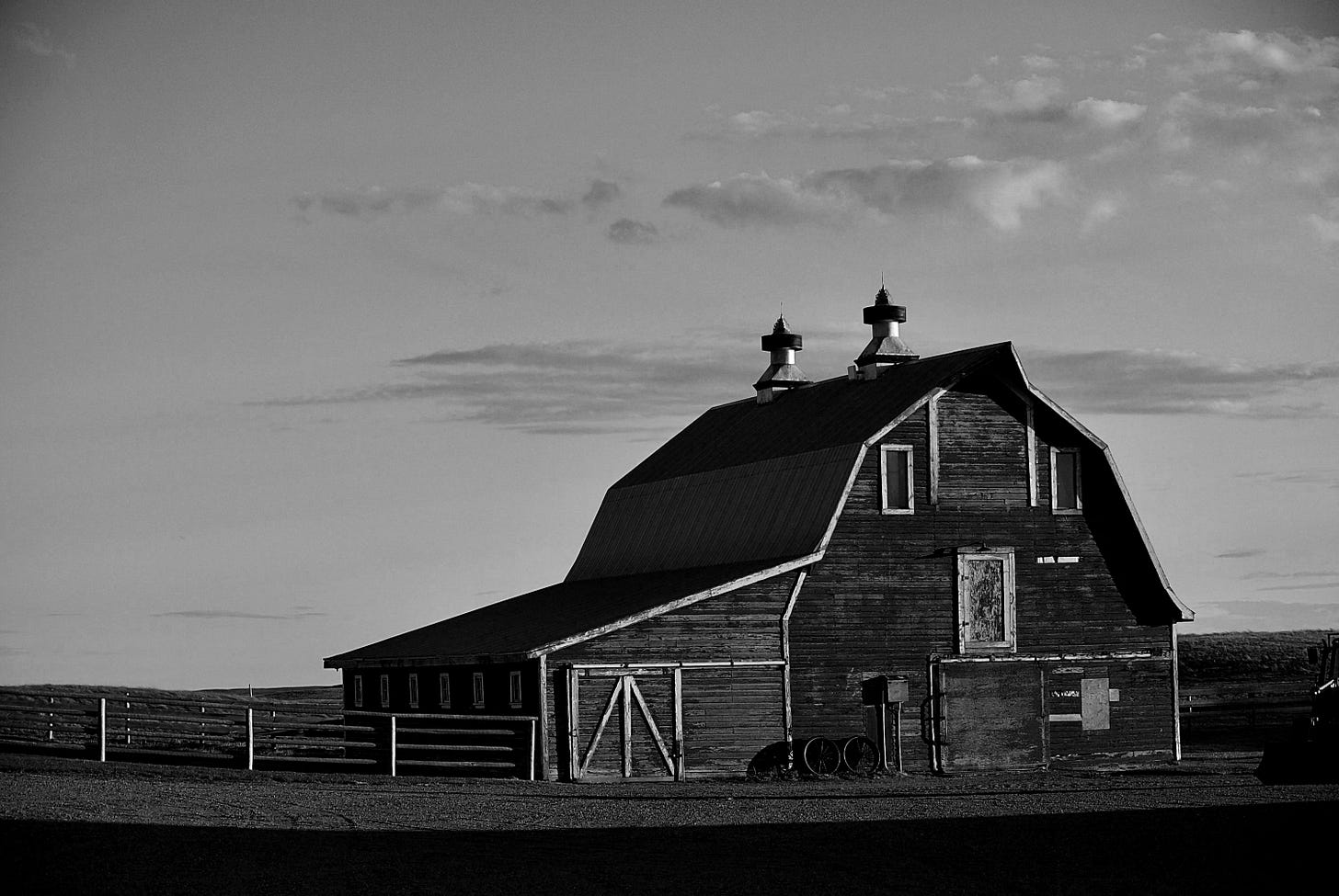 red wooden barn under blue sky during daytime