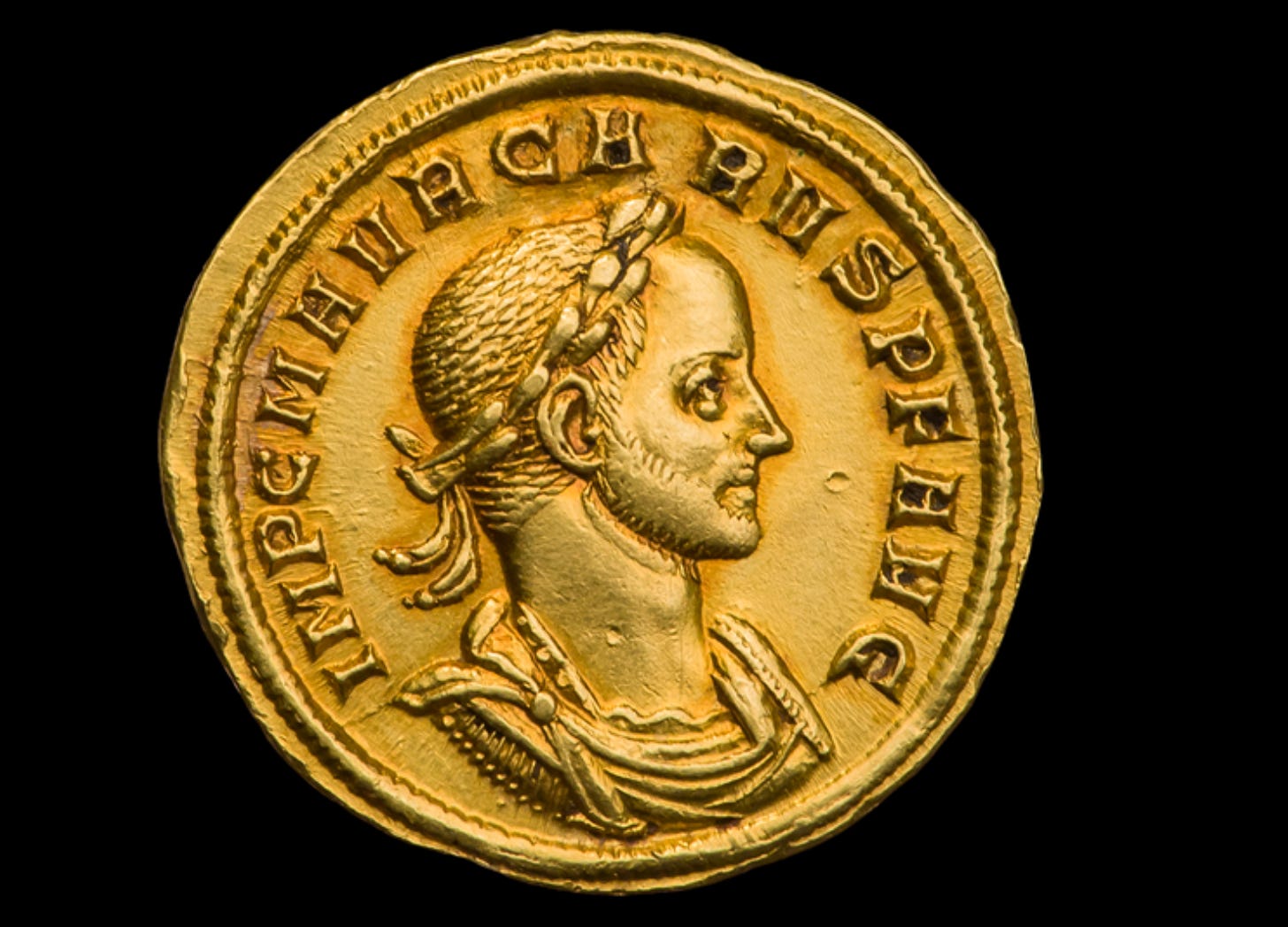 Aureus. Carus. c. AD 282–283, obverse. Bust of Carus in armor and cloak, facing right