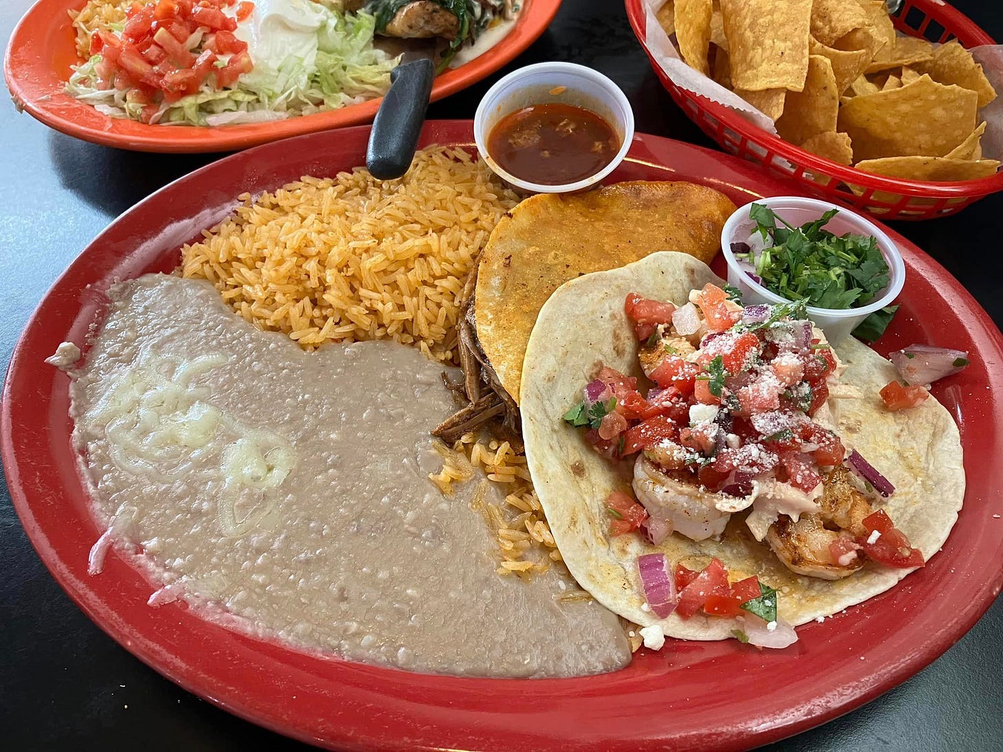 May be an image of taco and burrito