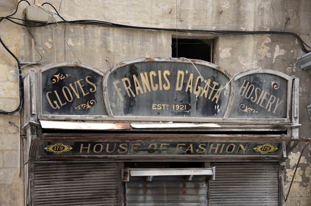 A sign on a building

AI-generated content may be incorrect.