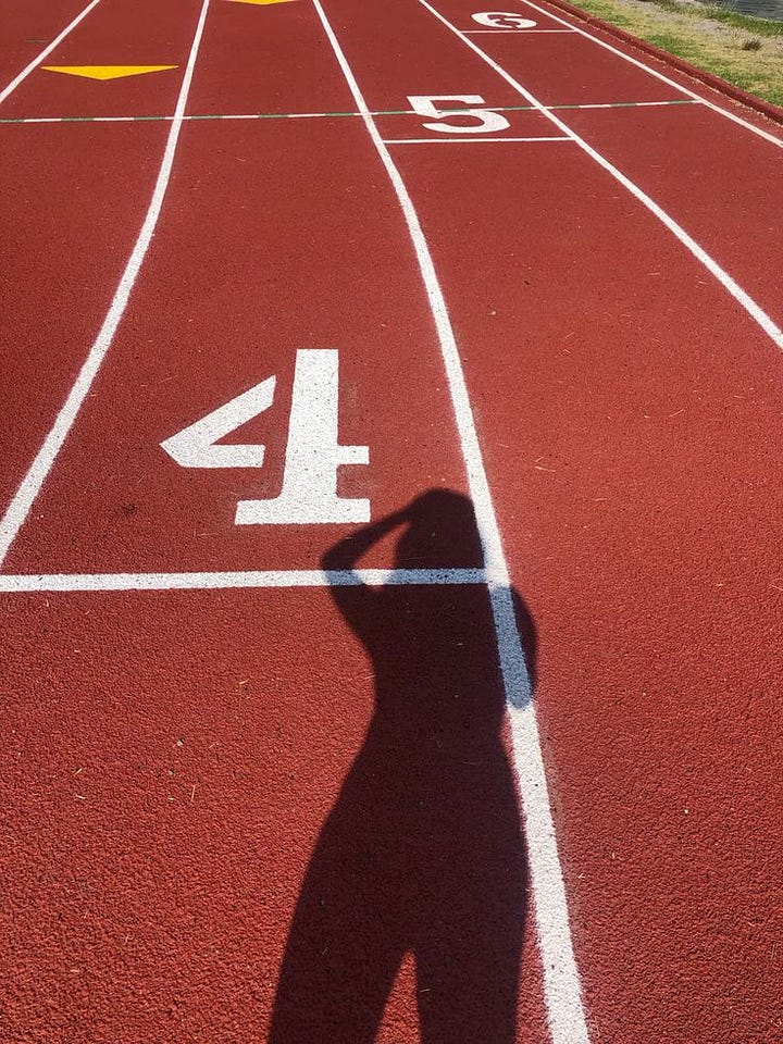 running outdoors in comfortable athletic gear during a sunny morning jog.