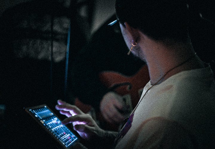 a bunch of rad photos with a rad rock band Kasador, and their fans in an underground house party in Calgary