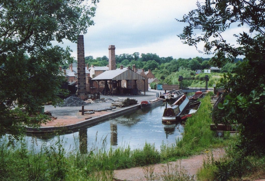 a river with a bunch of boats in it. a river with a bunch of boats in it.