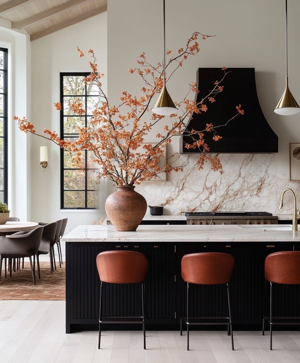 gorgeous oversized blossom arrangement on the countertop of a modern black, white, and copper kitchen, plush design interiors adelaide