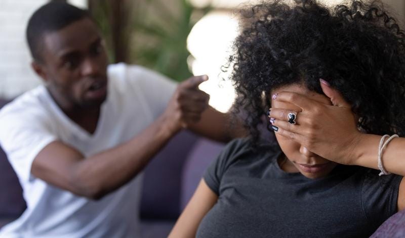 man and woman heated conversation, woman looks disappointed