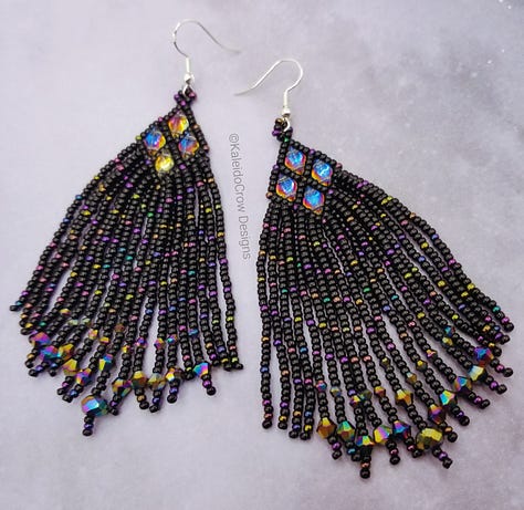 closeup photos of a beaded necklace made from black and rainbow/oil slick color shift beads