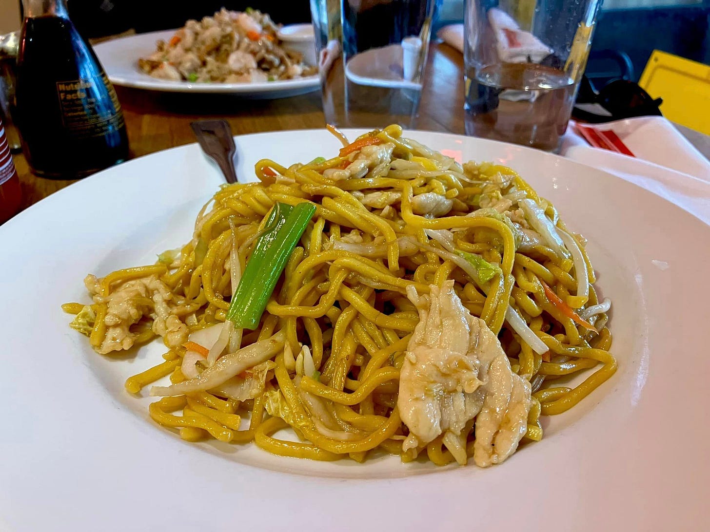 May be an image of pasta, chow mein and ramen