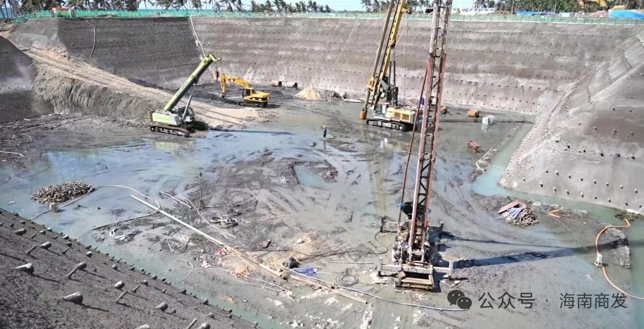 One of the launch pads being excavated with a few centimeters of water following rainfall.