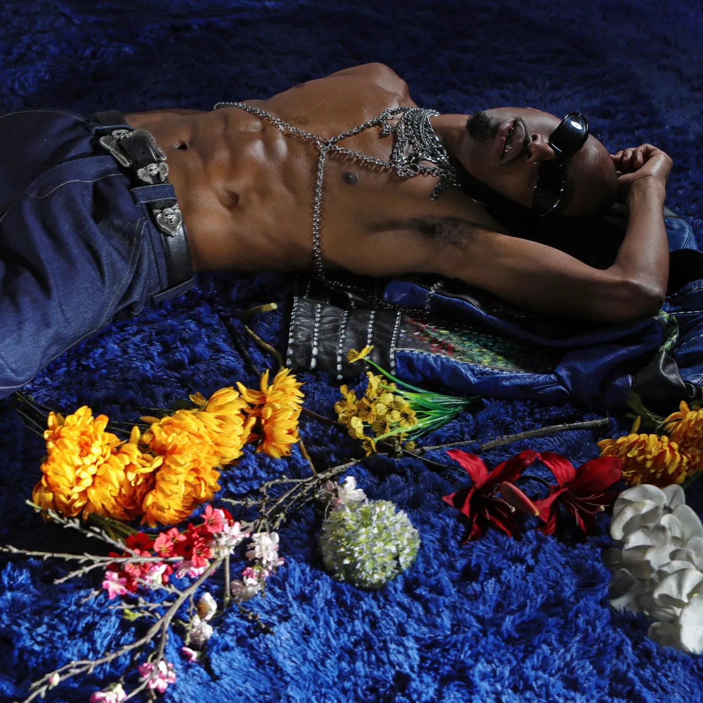 rockstar on blue carpet with various colored roses and flowers rockstar on blue carpet with various colored roses and flowers