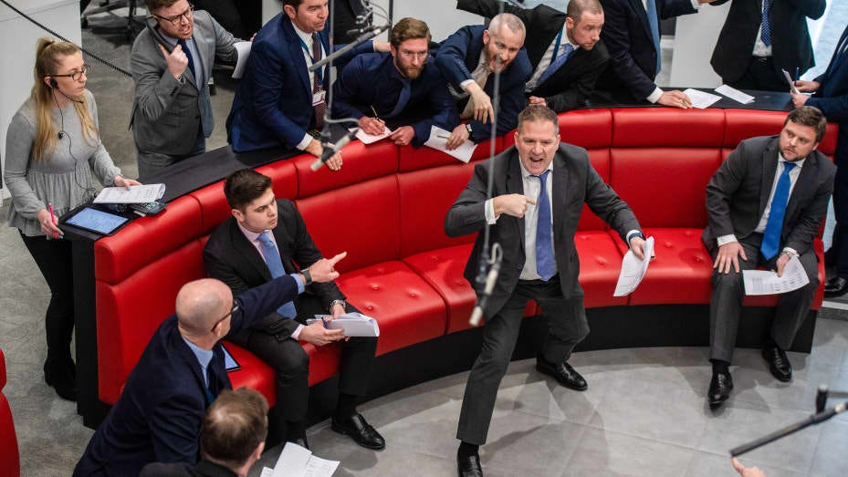 Traders, brokers and clerks on the trading floor of the open outcry pit at the London Metal Exchange Ltd.in London, U.K., on Monday, Feb. 28, 2022. The turmoil unleashed in commodity markets by Russia's invasion of Ukraine worsened on Monday as LNG orders