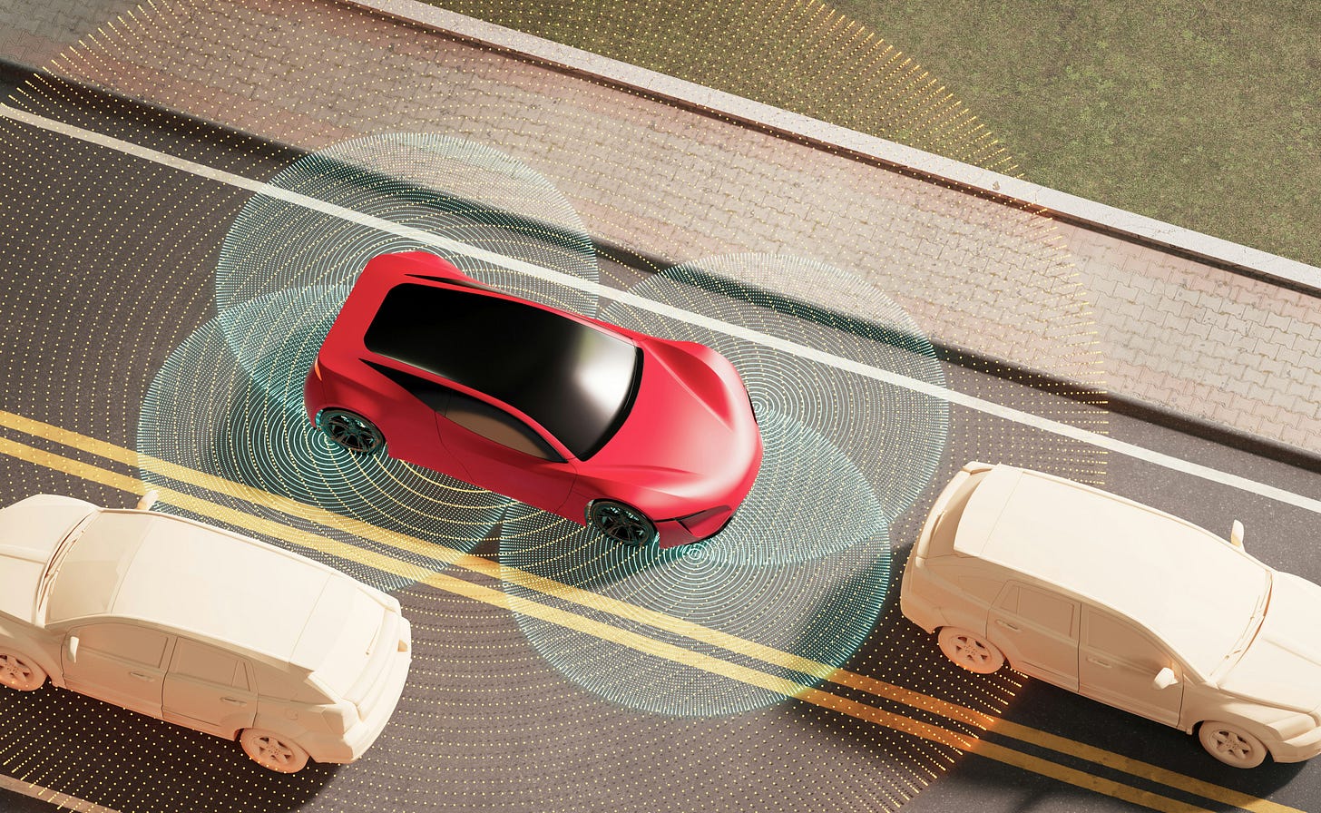 a 3D render of an autonomous vehicle with sensor inputs