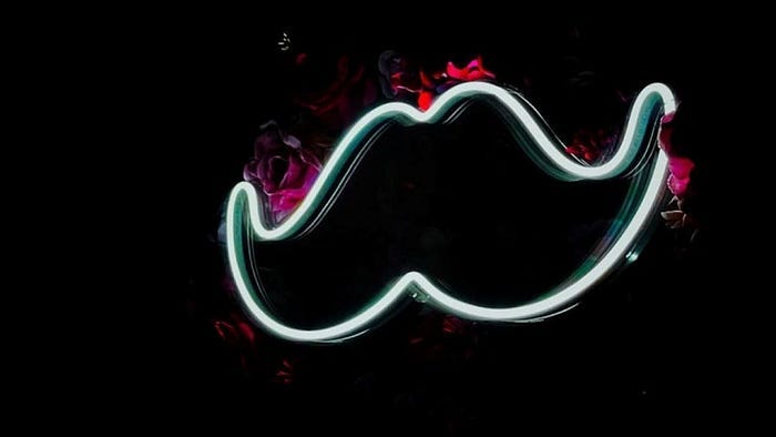 neon sign that looks like a handlebar mustache neon sign that looks like a handlebar mustache
