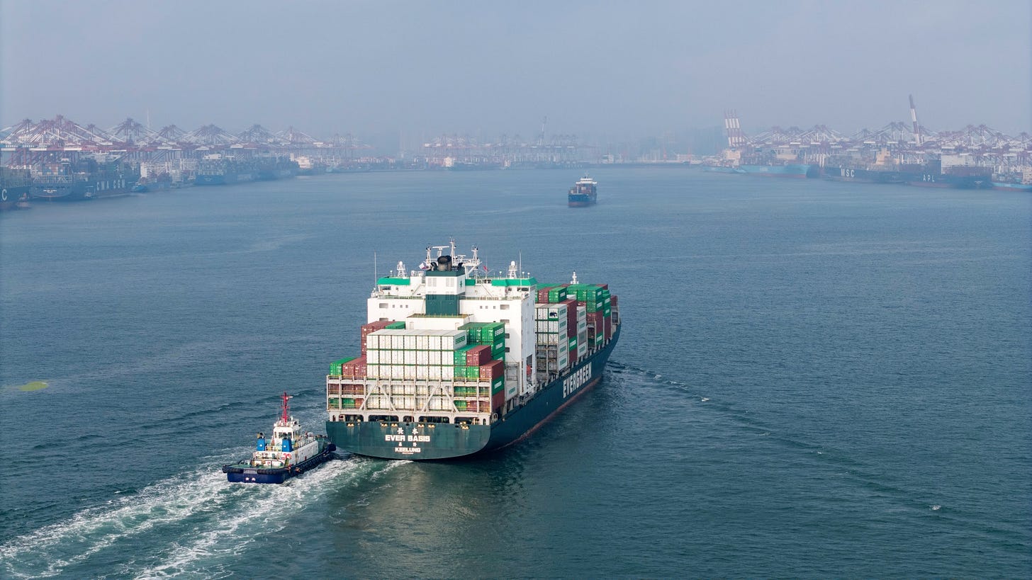 The Evergreen Marine Corp. Ever Basis container ship sails past the Qingdao Port in Qingdao, China, on Thursday, July 10, 2025. The world&#39;s two biggest economies agreed in May to lower their tariffs on each others’ exports for 90 days, with the US reducing its levies on most Chinese imports to 30%, from an earlier level of 145%. Source: Bloomberg