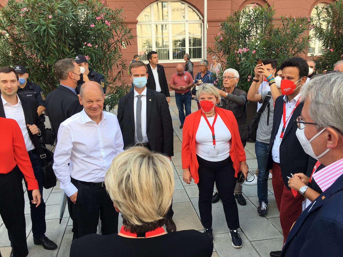SPD leader Olaf Scholz (centre-left in white) during the election campaign in Karlsruhe, German (File image: Twitter/@KatjaMast) SPD leader Olaf Scholz (centre-left in white) during the election campaign in Karlsruhe, German (File image: Twitter/@KatjaMast)