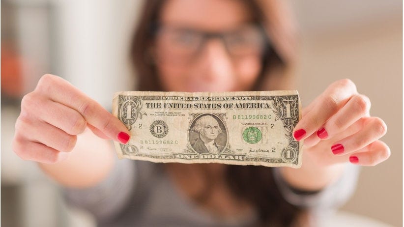 20150908162833-one-dollar-money-woman-ceo-boss