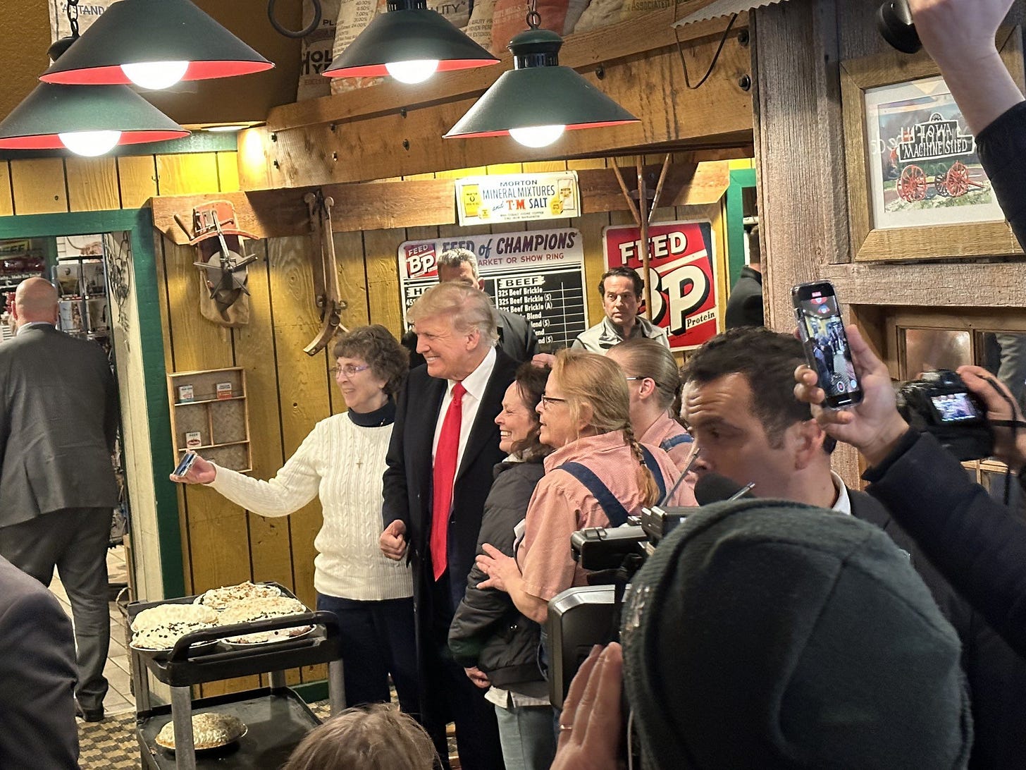 May be an image of 7 people, people standing and indoor