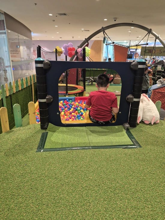 a little boy on a slide